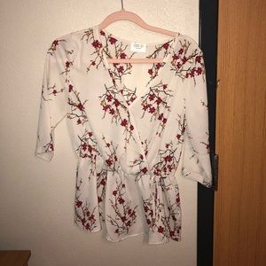 Large floral wrap top